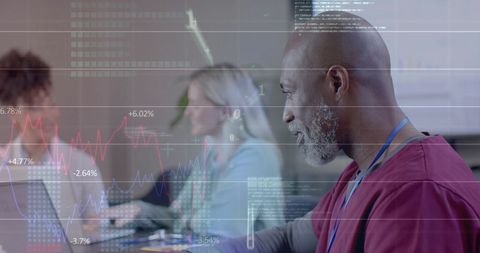 Diverse Medical Team Analyzing Global Data Trends in Modern Office - Download Free Stock Images Pikwizard.com