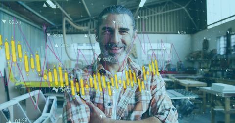 Smiling Male Carpenter with Overlaid Data Graph in Workshop