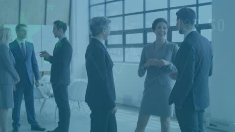 Diverse Business Team Engaging in Lively Office Discussion