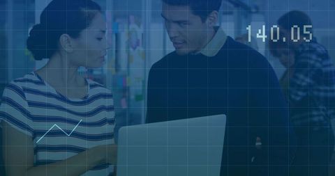 Collaborating colleagues analyzing financial dashboard on laptop with analytics overlay