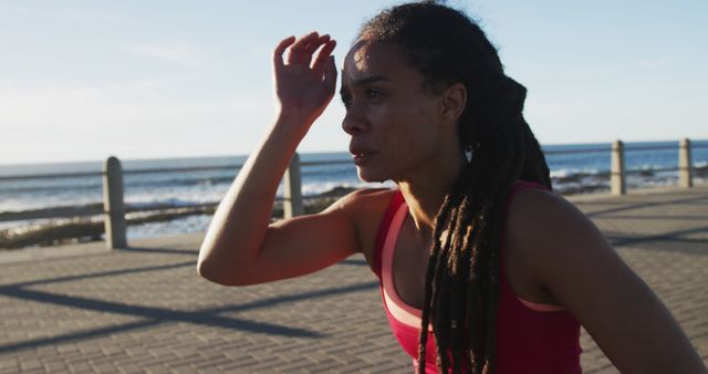 Exhausted Athlete Taking Moment of Rest After Run Outdoors Near Ocean - Download Free Stock Images Pikwizard.com