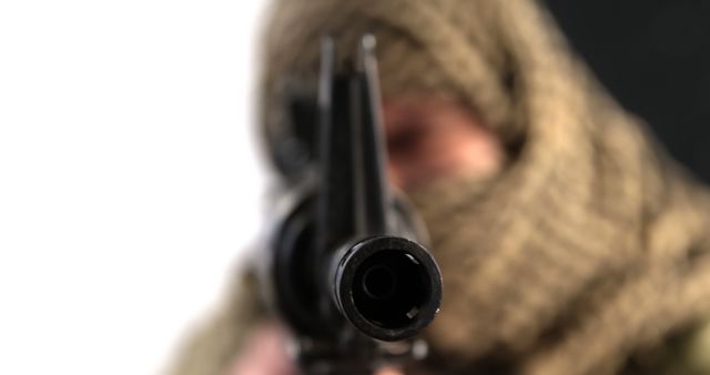 Person Masked Pointing Rifle With Close-Up Barrel Focus - Download Free Stock Images Pikwizard.com