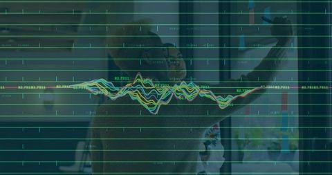 Businessman Analyzing Growth Charts with Female Colleague