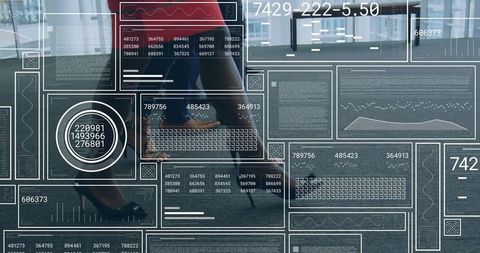 Businesswoman Walking Through Data-Driven Office Space