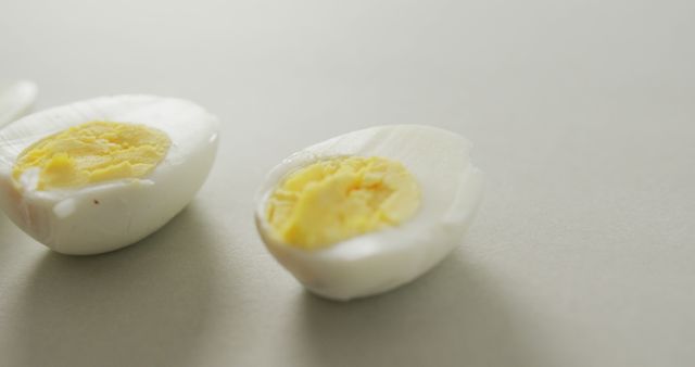 Sliced Hard-Boiled Egg Halves on White Background - Download Free Stock Images Pikwizard.com