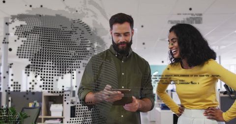 Diverse Business Team Analyzing Digital Financial Data in Office Environment