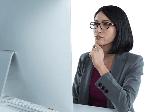 Transparent asian businesswoman concentrated at computer desk