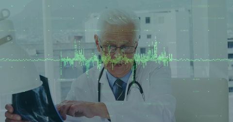 Senior doctor examining x-ray with digital data overlay for diagnostic analysis