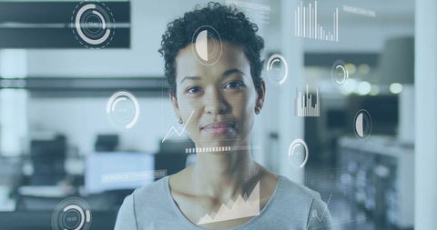 Confident Businesswoman with Data and Analytics Graphics