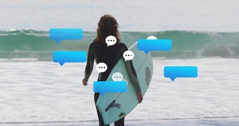 Surfer with surfboard surrounded by chat bubbles facing ocean