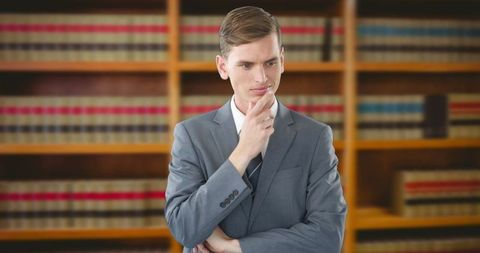 Thoughtful Businessman Analyzing SecondFloor Staff Context