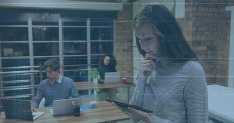 Businesswoman Analyzing Digital Data on Tablet in Office - Download Free Stock Images Pikwizard.com