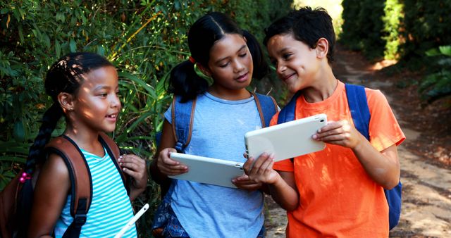 Children Exploring Outdoors Using Tablets, Embracing Technology - Download Free Stock Images Pikwizard.com