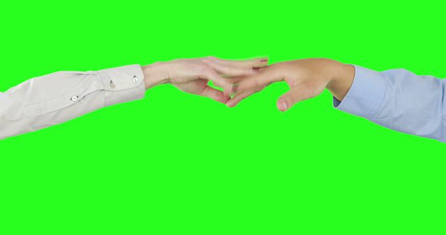 Business Collaboration: Two Hands Reaching Each Other Against Green - Download Free Stock Images Pikwizard.com