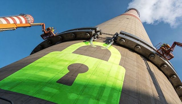 Industrial chimney securing with giant green padlock graphic and technicians on boom lifts