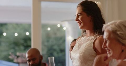 Bride Making a Toast at Elegant Wedding Reception Celebration
