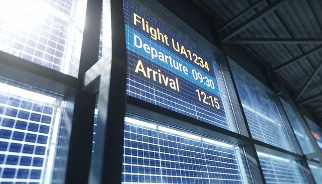 Flight ua1234 departure board showing 09:30 departure and 12:15 arrival in glass terminal