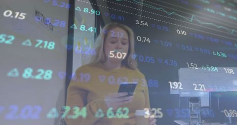 Businesswoman analyzing financial data over phone