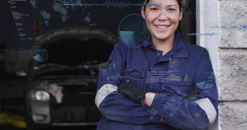 Smiling female mechanic leaning, crossing arms in garage with open hood and hud overlay