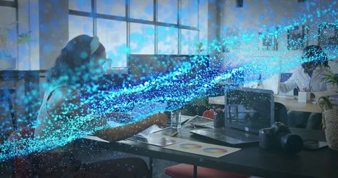 Creative professional analyzing color design in modern office