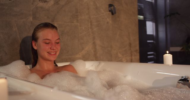 Young Woman Relaxing in Bubble Bath with Candles - Download Free Stock Images Pikwizard.com