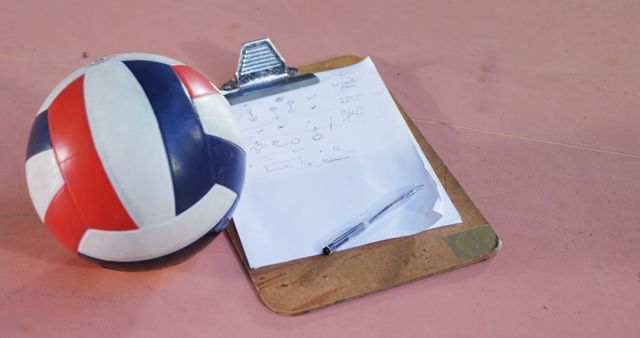 Volleyball Tactics Planning with Clipboard and Pen on Court - Download Free Stock Images Pikwizard.com