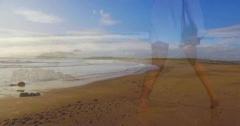 Ethereal double exposure walking legs over coastal beach with footprints and blue skirt