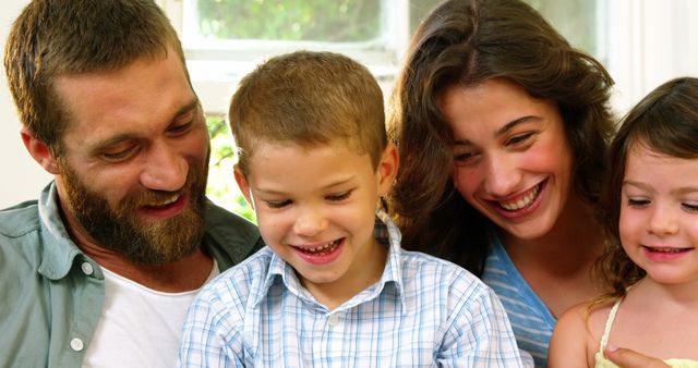 Happy Family Bonding and Smiling Together at Home - Download Free Stock Images Pikwizard.com