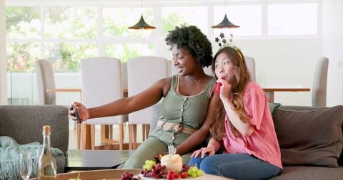 Happy LGBTQIA+ Couple Celebrating Birthday Together at Home