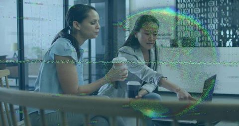 Two colleagues collaborating, pointing at laptop and holding coffee with glitch overlay