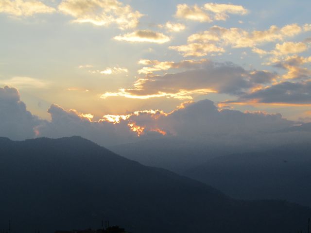 Scenic view of mountains against sky at sunset - Download Free Stock Photos Pikwizard.com