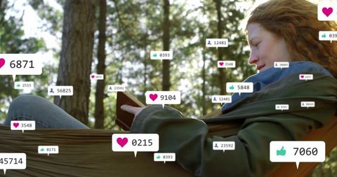 Woman Relaxing in Forest Hammock with Social Media Interactions Light Overlay