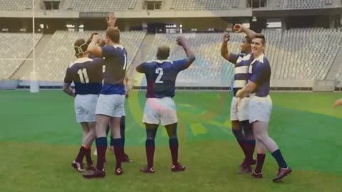 Rugby Players Celebrating Try on Field Showing Team Spirit