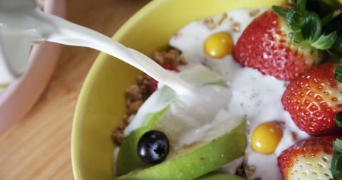 Healthy Breakfast Bowl with Fresh Berries and Milk Splash - Download Free Stock Images Pikwizard.com