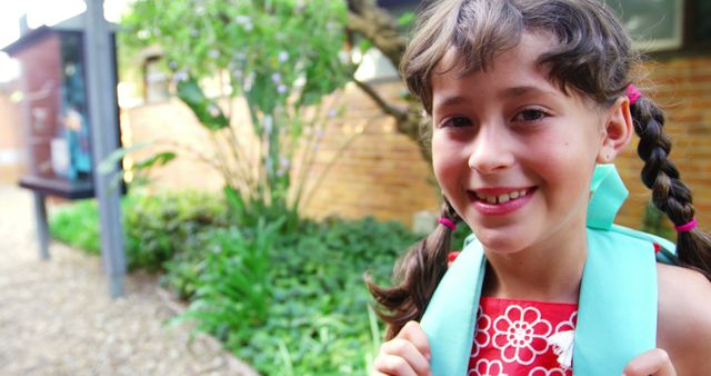 Smiling Schoolgirl with Backpack on Campus - Download Free Stock Images Pikwizard.com