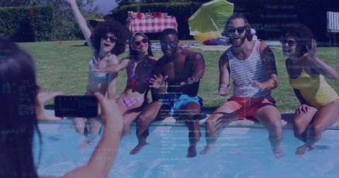 Energetic group of friends enjoying a poolside vacation celebration