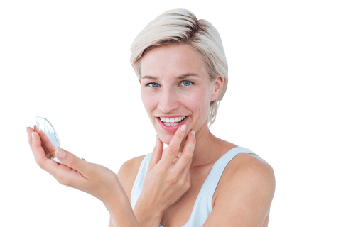 blonde woman checking skin reflection in mirror transparent background - Download Free Stock Videos Pikwizard.com