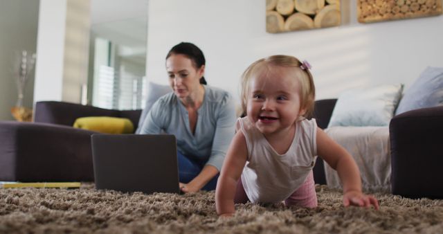 Caucasian mother using laptop while baby crawling on the floor at home. motherhood, love and childcare concept