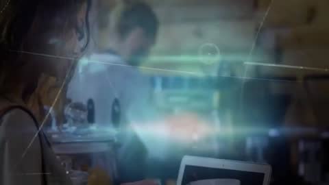 Woman Working on Laptop in Modern Cafe with Holographic Effects