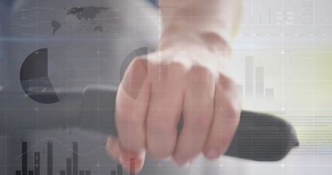 Close-up hand gripping textured handlebar with data visualization overlays and charts