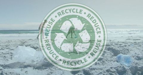Couple Cleaning Beach with Recycling Sign Overlay for Environmental Awareness