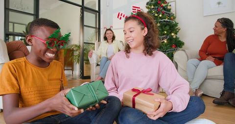 Diverse Family Celebrating Christmas with Gifts and Joy