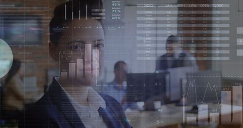 Smiling Businesswoman with Graph Overlays at Modern Office