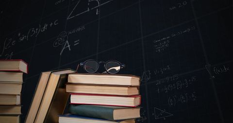 Eyeglasses on Books with Animated Mathematical Equations - Download Free Stock Images Pikwizard.com