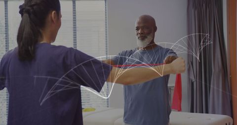 Mixed Race Female Doctor Assisting Senior Patient with Exercise