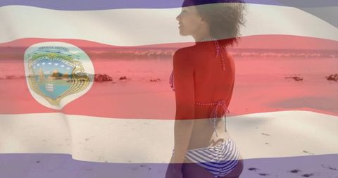 Bikini-clad woman enjoying costa rican beach with flag overlay