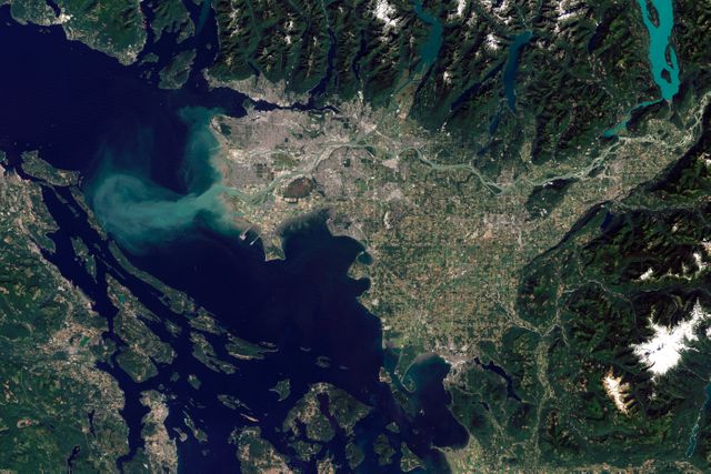 The Thematic Mapper on the Landsat 5 satellite captured this image of Vancouver on September 7, 2011. Flowing through braided channels, the Fraser River meanders toward the sea, emptying through multiple outlets.  Moe info: <a href="http://earthobservatory.nasa.gov/IOTD/view.php?id=77368" rel="nofollow">earthobservatory.nasa.gov/IOTD/view.php?id=77368</a>  NASA Earth Observatory image created by Robert Simmon and Jesse Allen, using Landsat data provided by the United States Geological Survey.  Instrument: Landsat 5 - TM  Credit: <b><a href="http://www.earthobservatory.nasa.gov/" rel="nofollow"> NASA Earth Observatory</a></b>  <b><a href="http://www.nasa.gov/audience/formedia/features/MP_Photo_Guidelines.html" rel="nofollow">NASA image use policy.</a></b>  <b><a href="http://www.nasa.gov/centers/goddard/home/index.html" rel="nofollow">NASA Goddard Space Flight Center</a></b> enables NASA’s mission through four scientific endeavors: Earth Science, Heliophysics, Solar System Exploration, and Astrophysics. Goddard plays a leading role in NASA’s accomplishments by contributing compelling scientific knowledge to advance the Agency’s mission.  <b>Follow us on <a href="http://twitter.com/NASAGoddardPix" rel="nofollow">Twitter</a></b>  <b>Like us on <a href="http://www.facebook.com/pages/Greenbelt-MD/NASA-Goddard/395013845897?ref=tsd" rel="nofollow">Facebook</a></b>  <b>Find us on <a href="http://instagram.com/nasagoddard?vm=grid" rel="nofollow">Instagram</a></b>