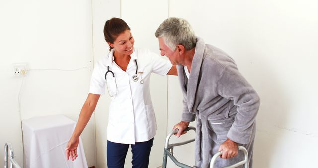 Nurse Assisting Senior Man Using a Walker - Download Free Stock Images Pikwizard.com