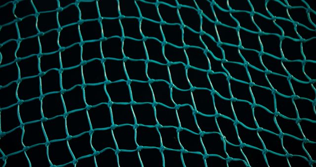 Close-Up View of Dark Colored Netting Against Black Background - Download Free Stock Images Pikwizard.com