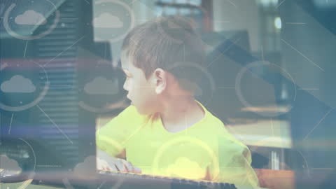 Young Boy Using Computer with Digital Network Overlay